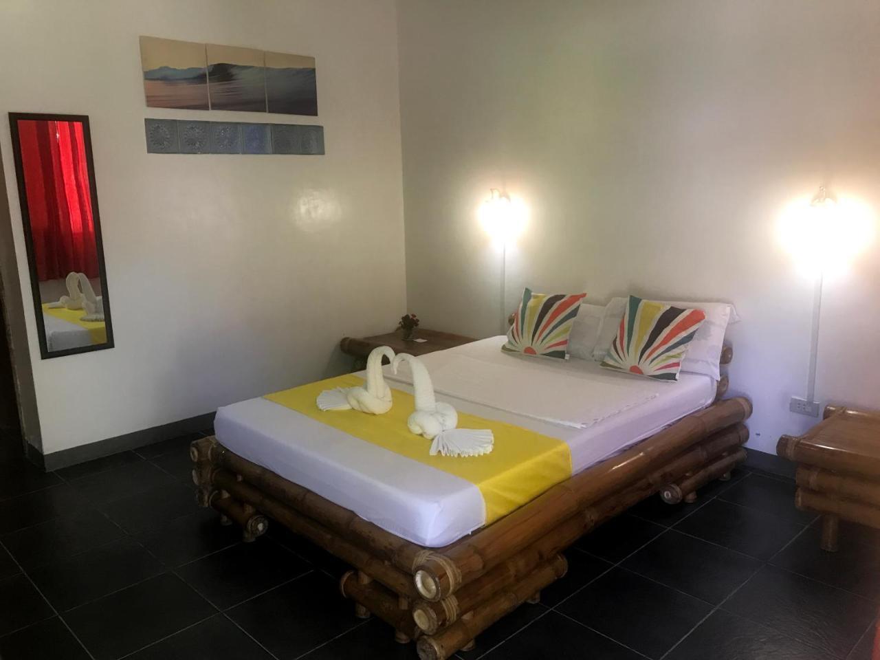Neptune Diving Resort Santander Bagian luar foto