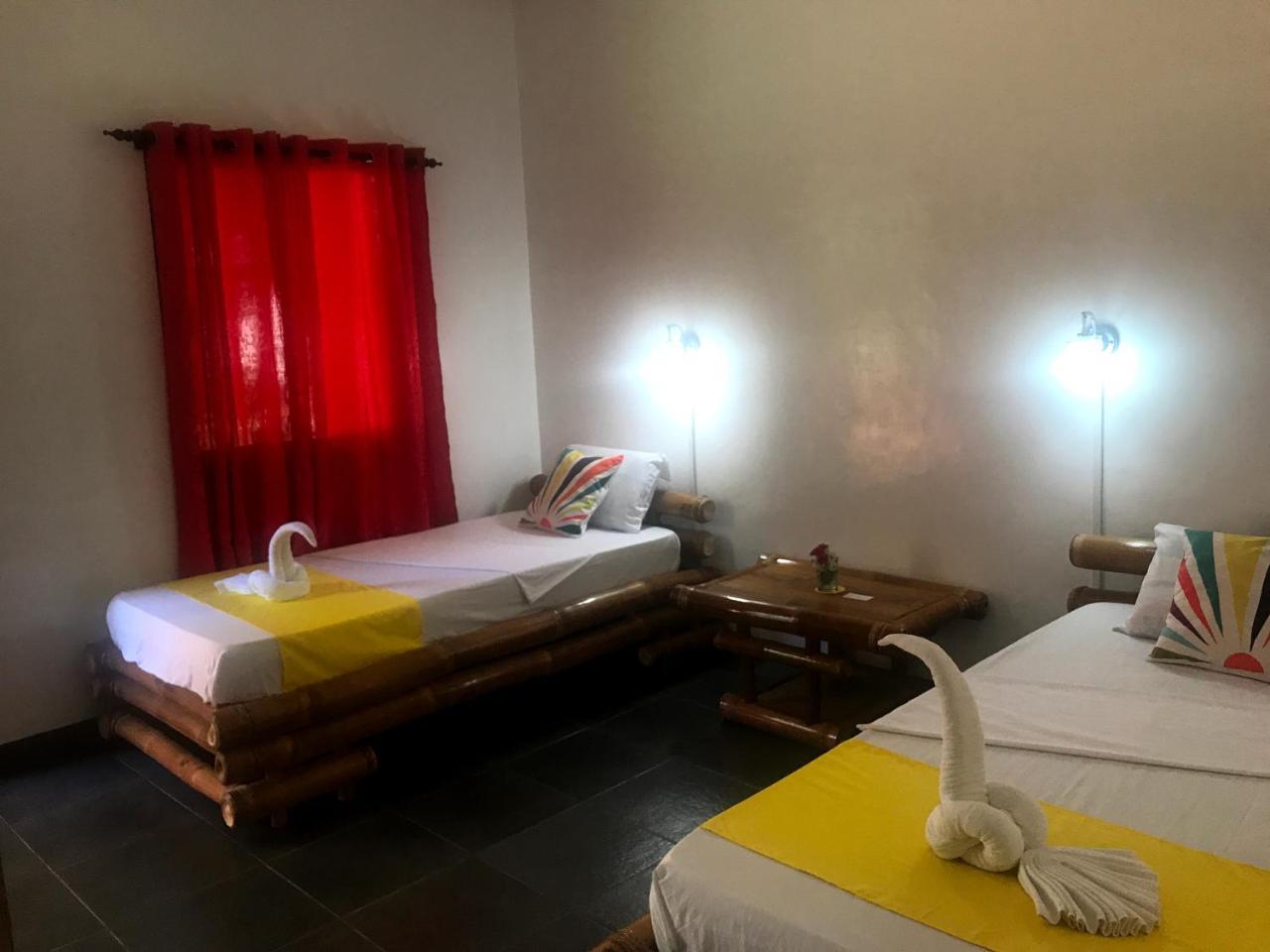 Neptune Diving Resort Santander Bagian luar foto